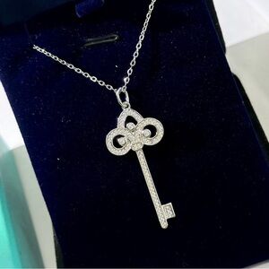Tiffany & Co. Elegant Silver Key Pendant Necklace